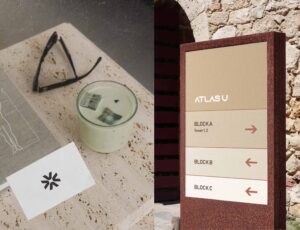 Atlas U branding design – minimalist real estate logo with circular motif and neutral color palette by Shruti Singh